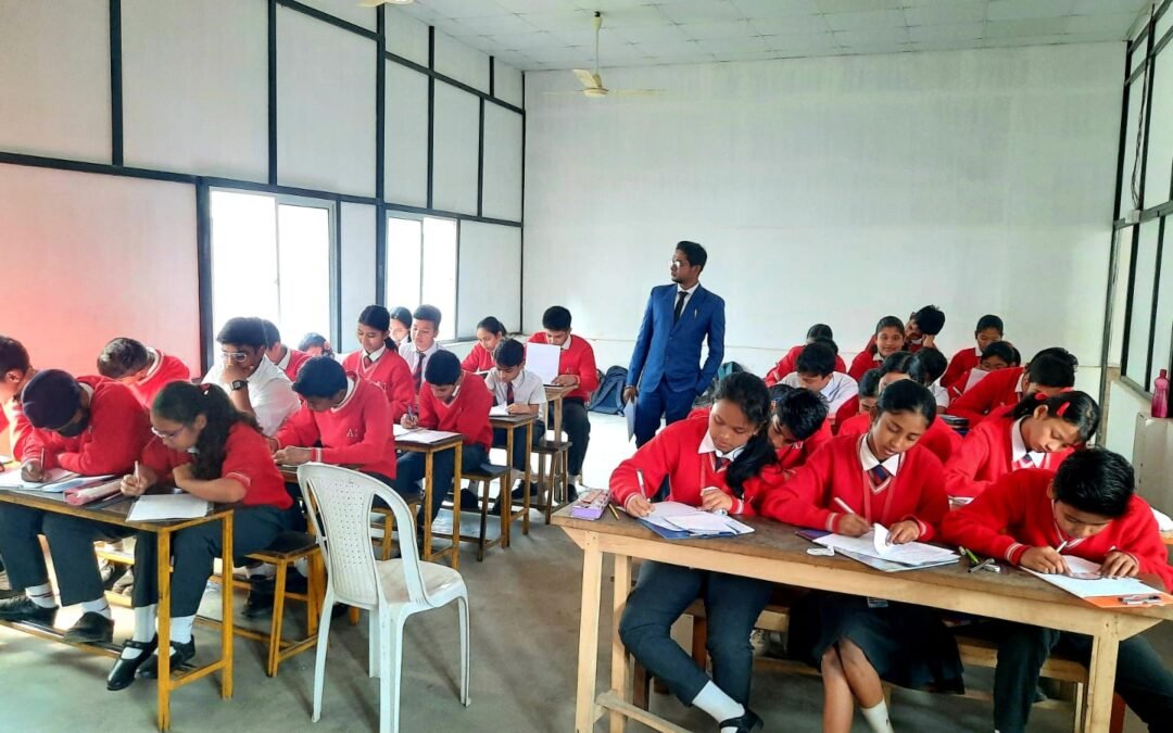 Students learning with caring teacher in class room